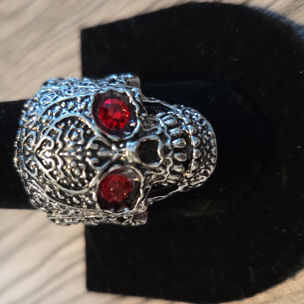 Intricate Skull Ring with Red Eyes